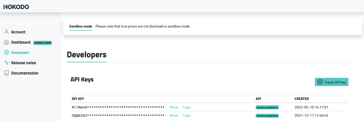 Account Management page showing API Keys in a table (most of the key is replaced by stars)